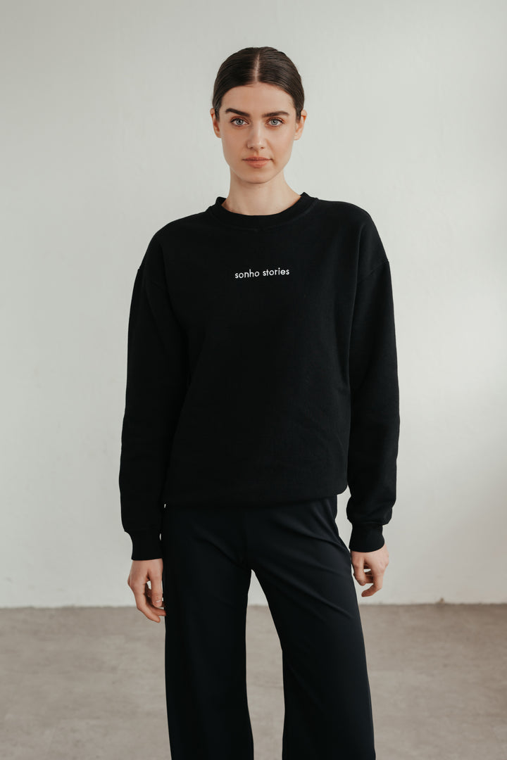 Unisex Sweater mit lockerer Passform und gesticktem Logo